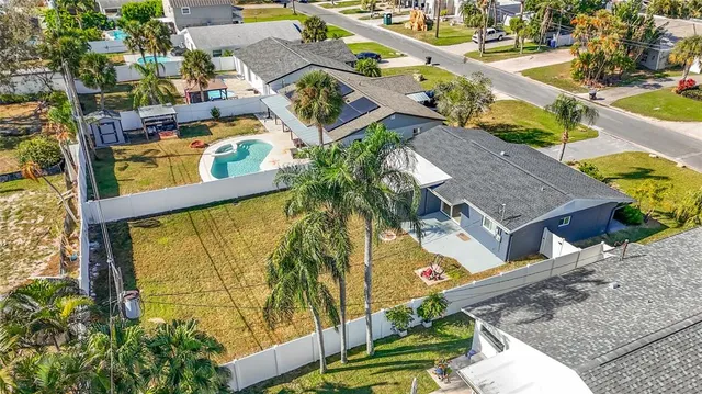 a view of swimming pool with a patio