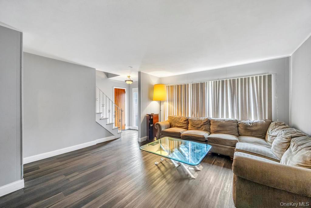 55 Amityville Road Melville, NY 11747 - Photo 5 of 21 a living room with furniture and a window