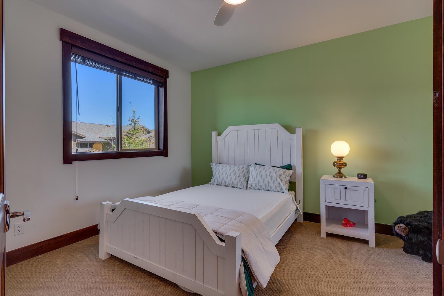 11541 Dolomite Way, Unit 3 Truckee, CA 96161 - Photo 20 of 28 a bedroom with a bed and a window
