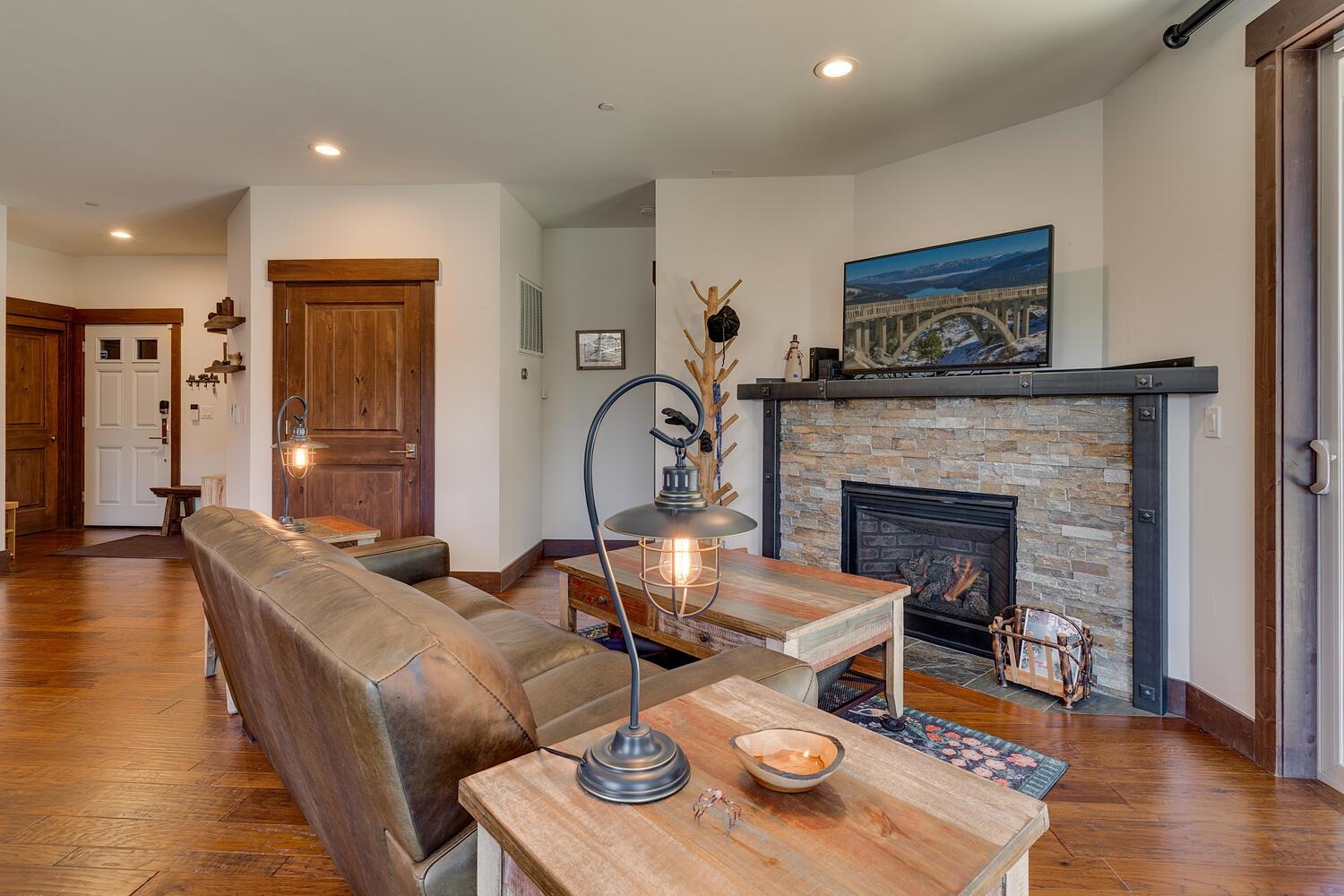 11541 Dolomite Way, Unit 3 Truckee, CA 96161 - Photo 5 of 28 a living room with furniture and a fireplace