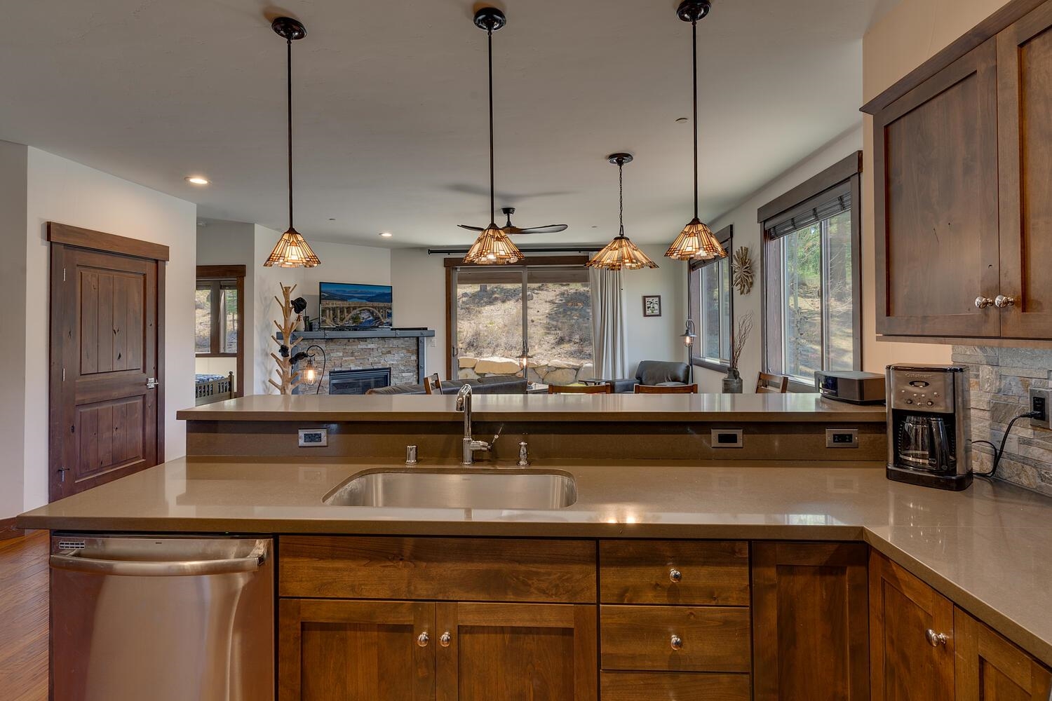 11541 Dolomite Way, Unit 3 Truckee, CA 96161 - Photo 7 of 28 a kitchen with a sink a counter space appliances and cabinets