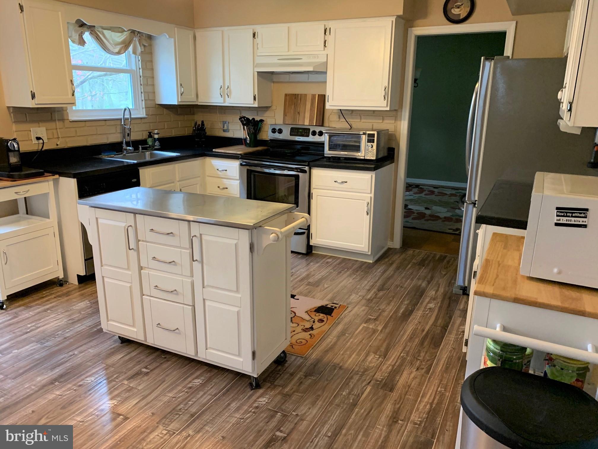 3208 Raye Road Thorndale, PA 19372 - Photo 14 of 36 Kitchen leads to the Dining Room