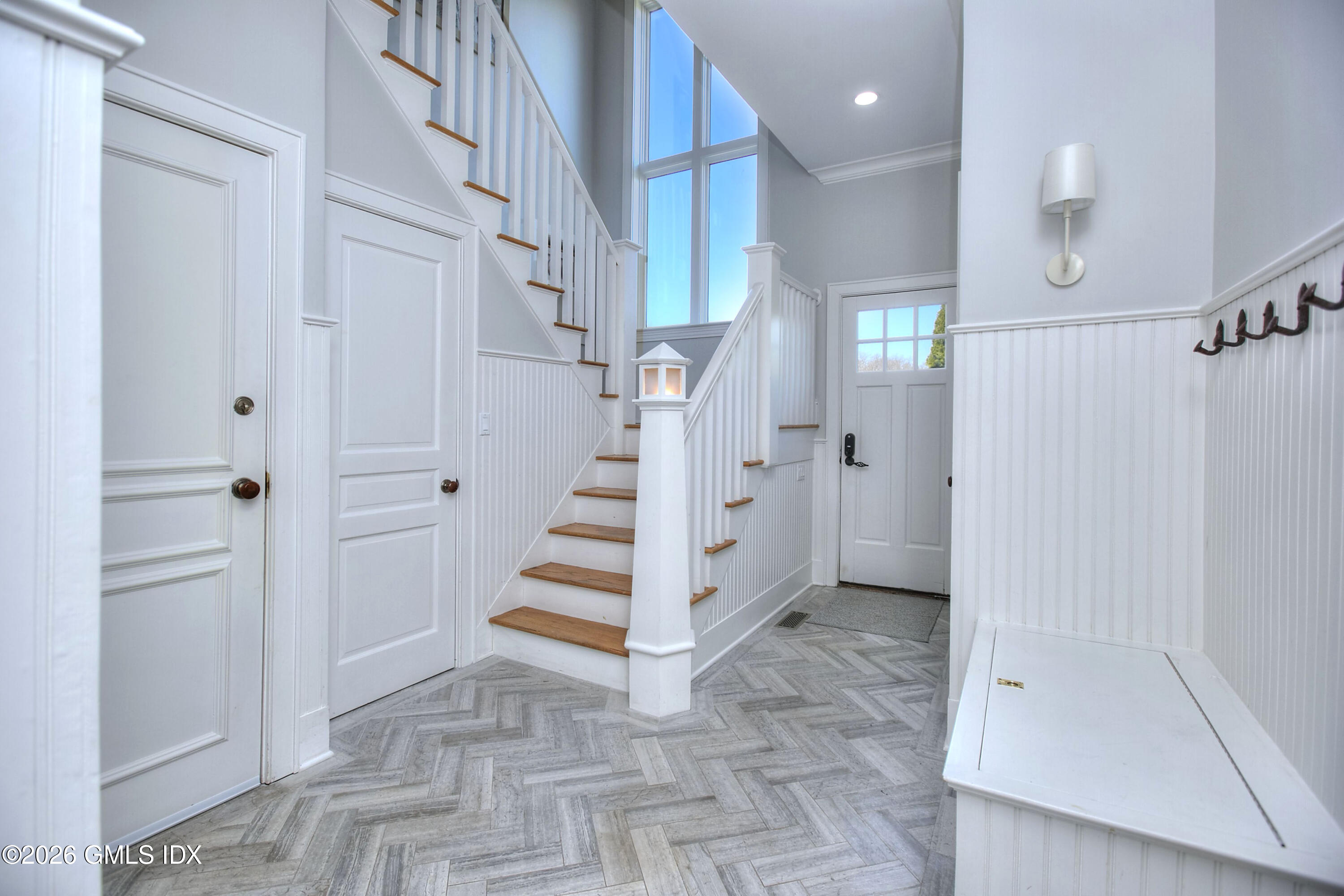 3 Shorehaven Road Norwalk, CT 06855 - Photo 21 of 40 a view of entryway with white walls and stairs