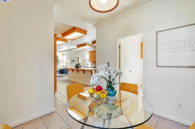 a view of a living room with a dining table