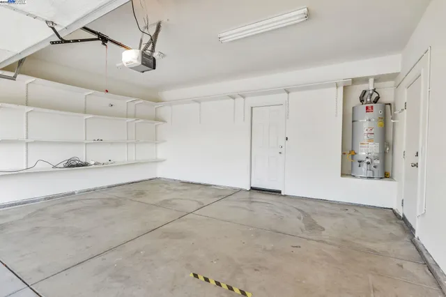 a view of a patio with couches table and chairs and potted plants