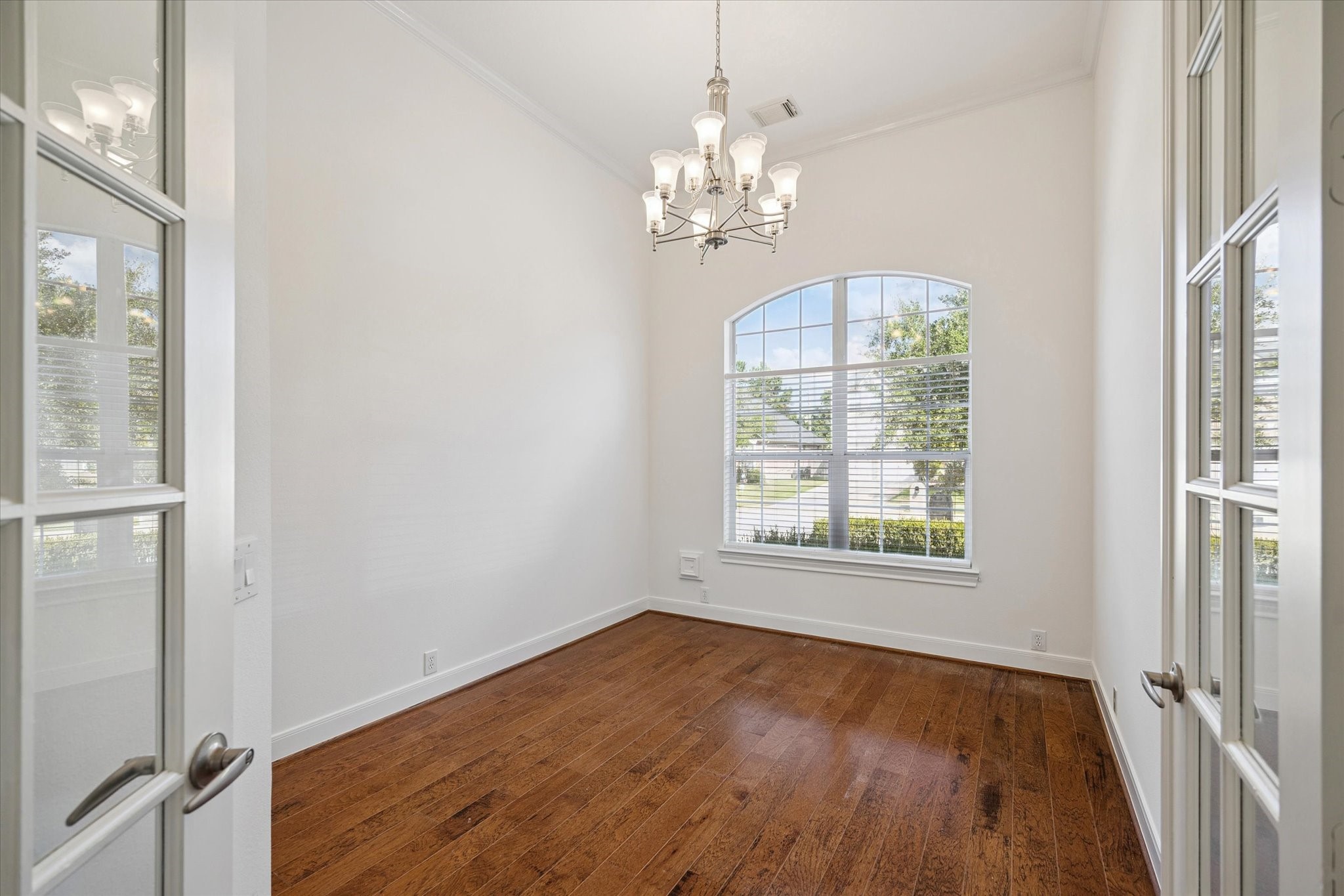 7211 Diamond Falls Lane Spring, TX 77389 - Photo 19 of 29 Versatile study or formal living area on 1st floor with French doors and front yard views.