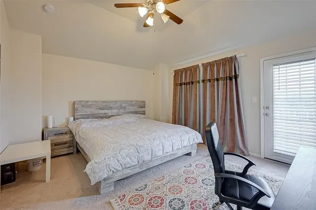 a bathroom with a sink double vanity and a toilet