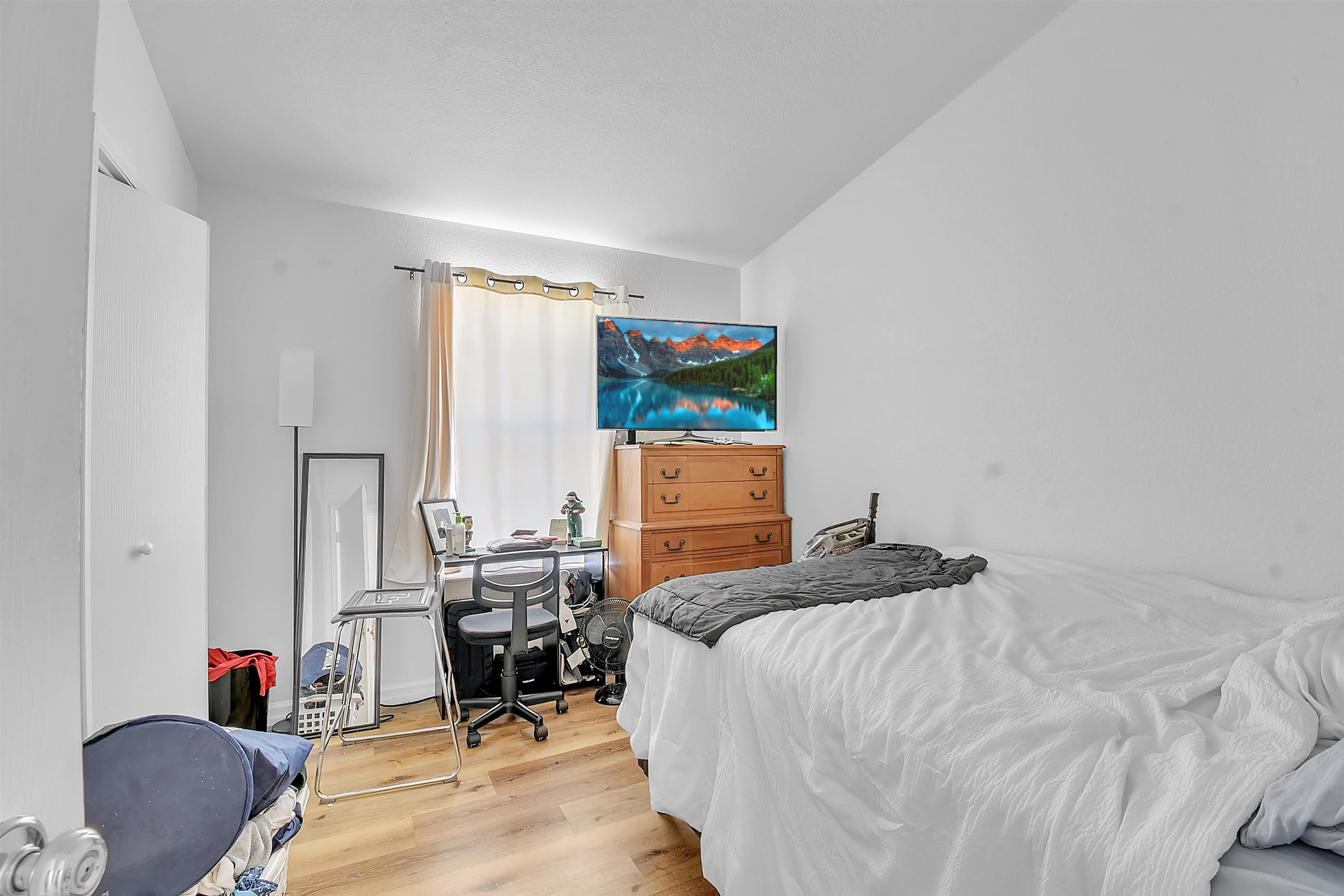 67 Anderson Street St. Augustine, FL 32084 - Photo 13 of 22 a bedroom with a bed and a chair