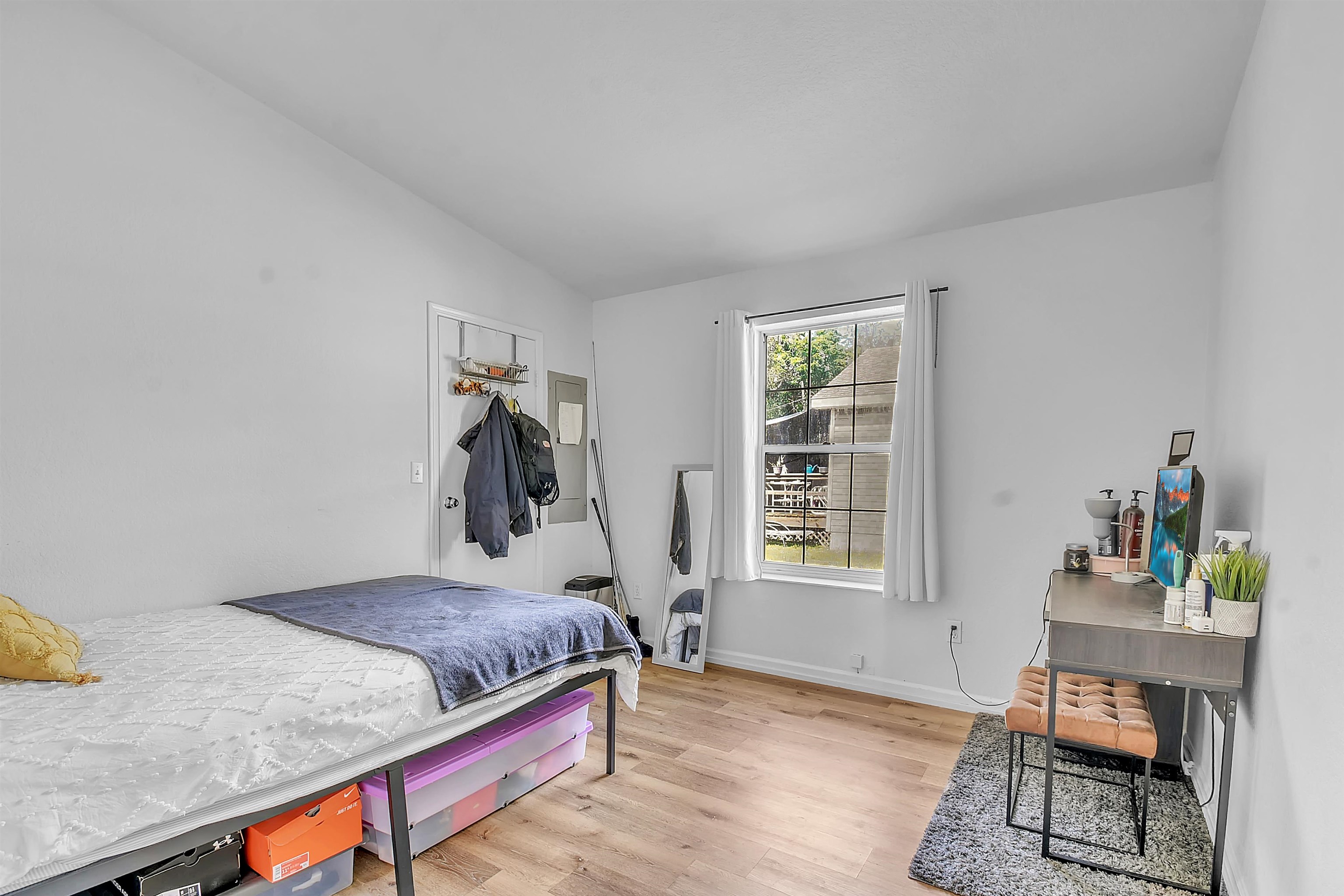 67 Anderson Street St. Augustine, FL 32084 - Photo 14 of 22 a bedroom with a bed and a window