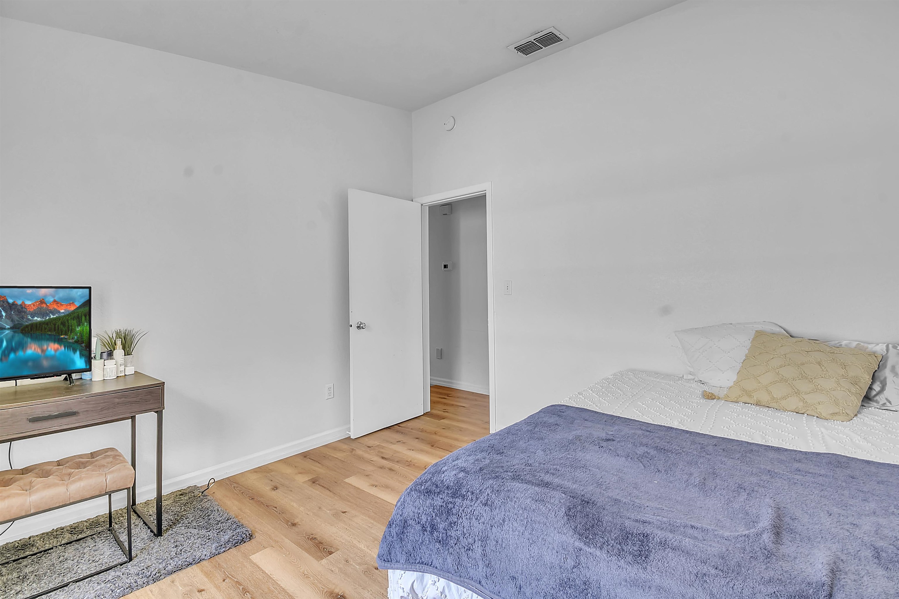 67 Anderson Street St. Augustine, FL 32084 - Photo 15 of 22 a bedroom with a bed and a table