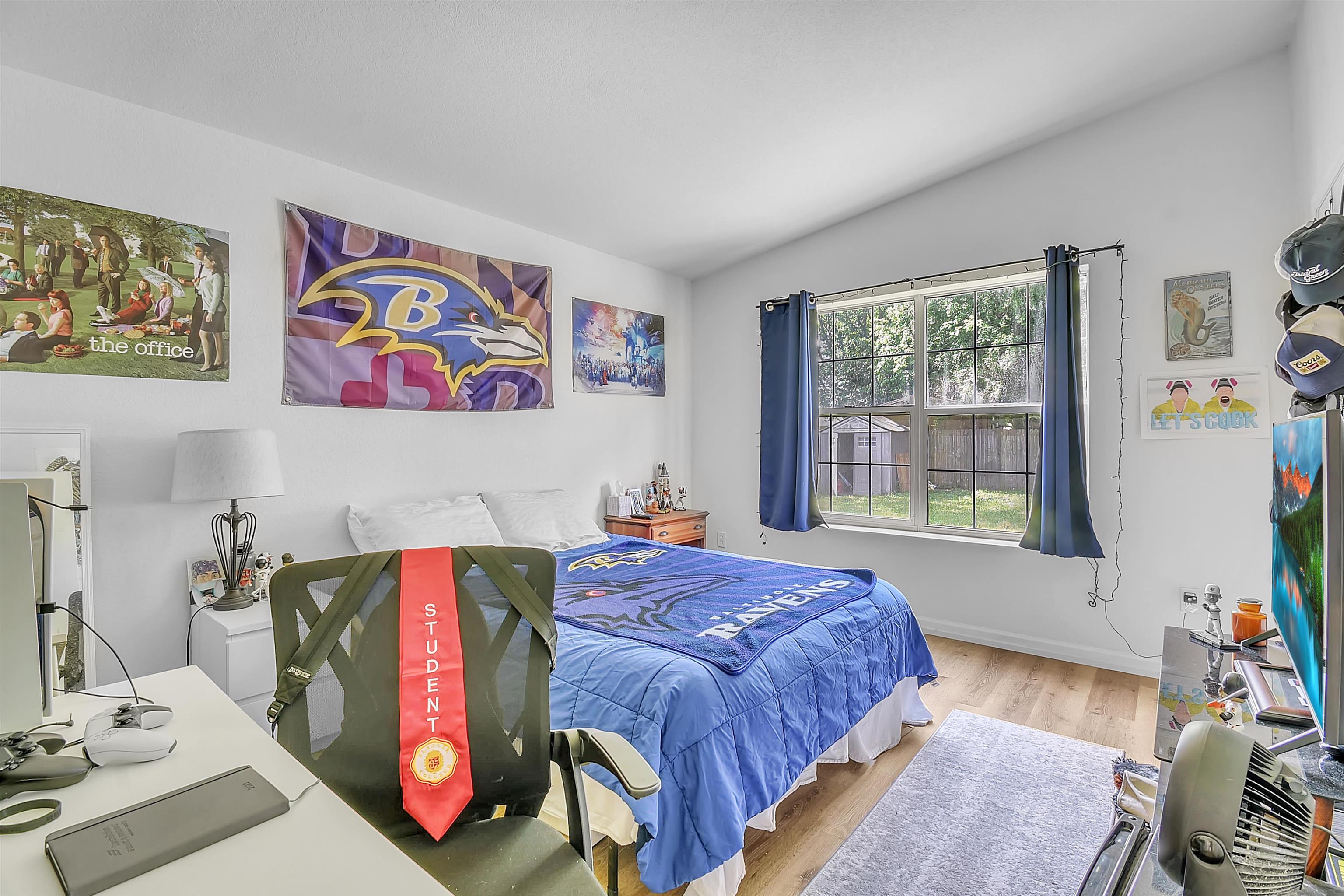 67 Anderson Street St. Augustine, FL 32084 - Photo 16 of 22 a bedroom with a bed dresser and window