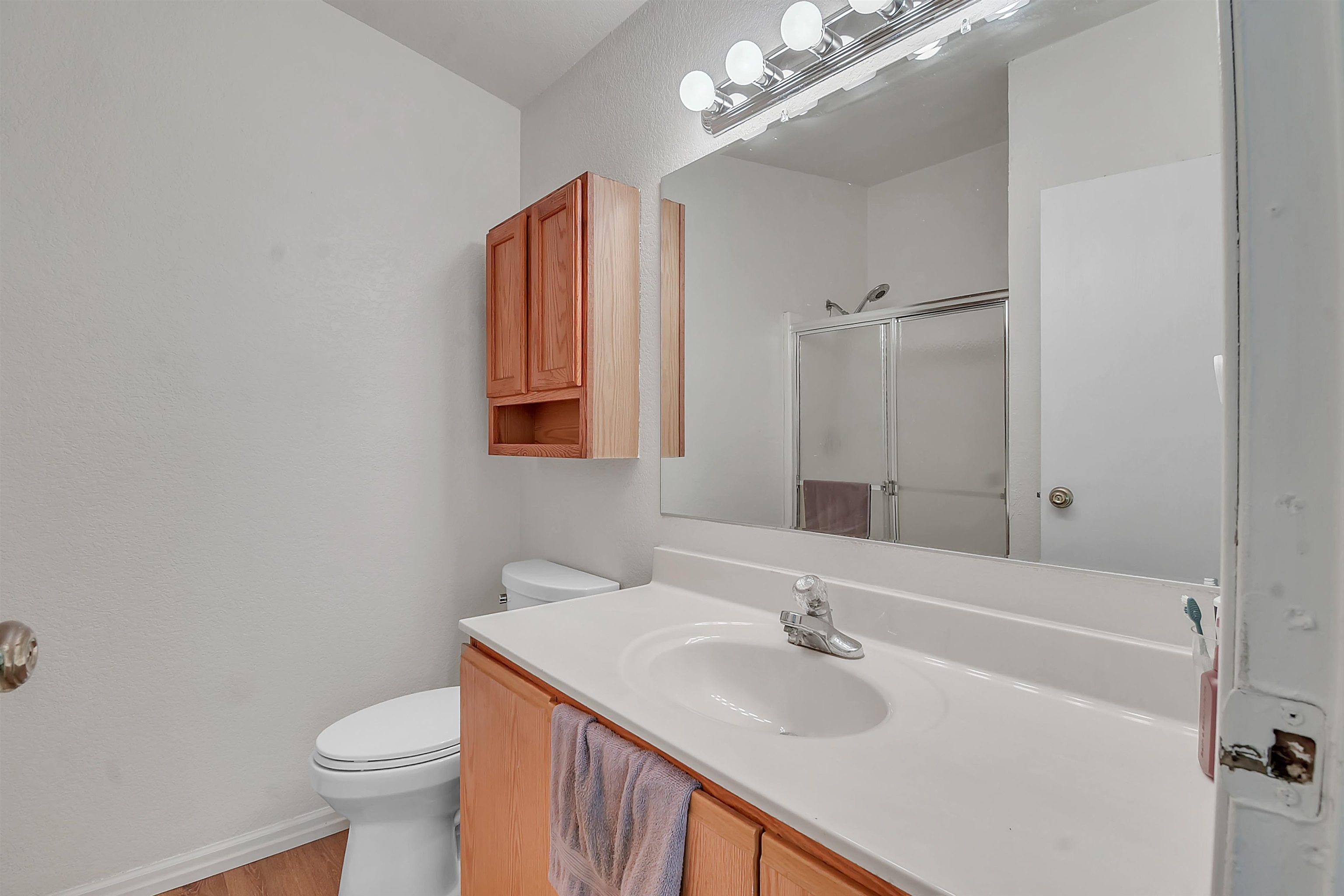 67 Anderson Street St. Augustine, FL 32084 - Photo 19 of 22 a bathroom with a sink a toilet and shower