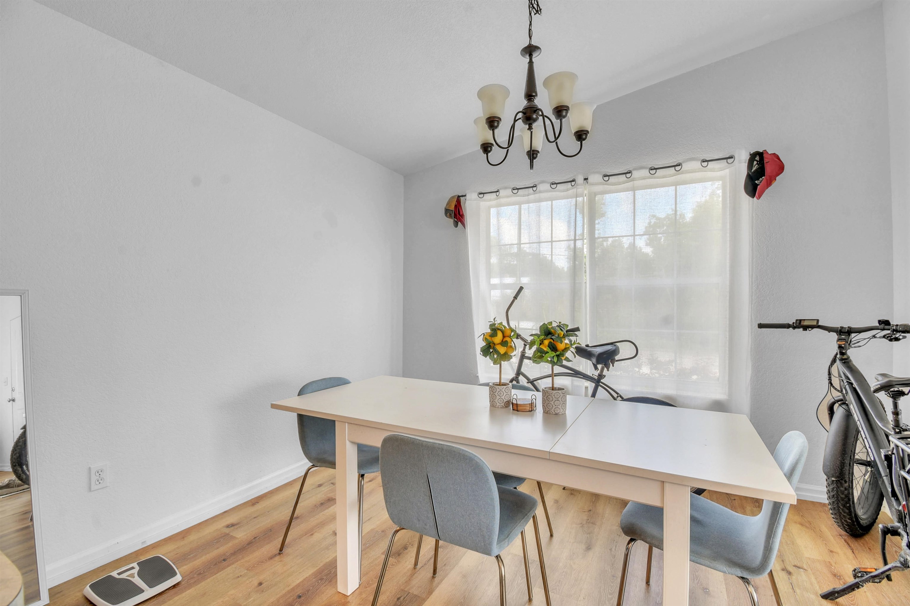 67 Anderson Street St. Augustine, FL 32084 - Photo 20 of 22 a view of a dining room with furniture and wooden floor
