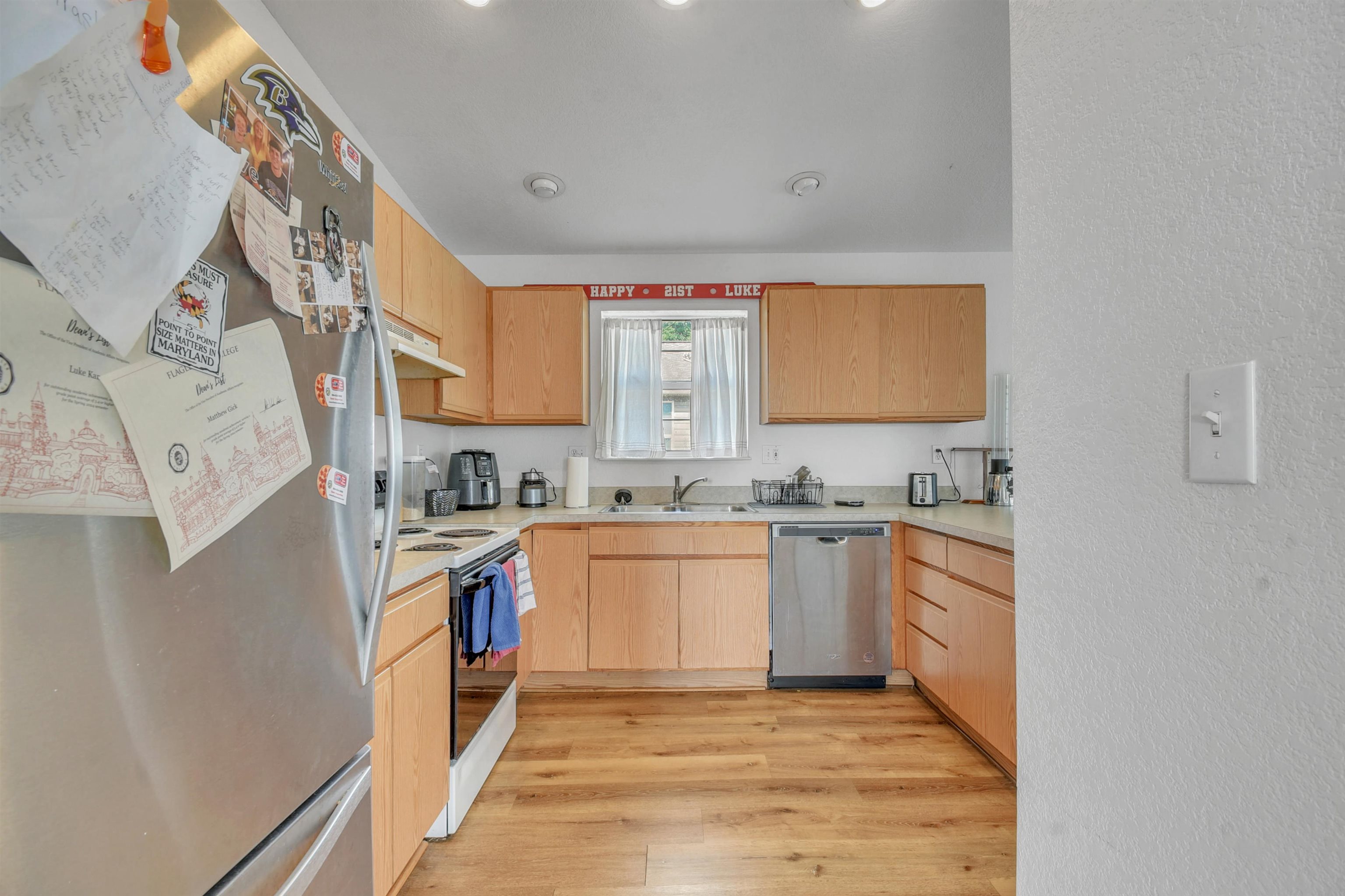 67 Anderson Street St. Augustine, FL 32084 - Photo 9 of 22 a large kitchen with stainless steel appliances granite countertop a sink and cabinets