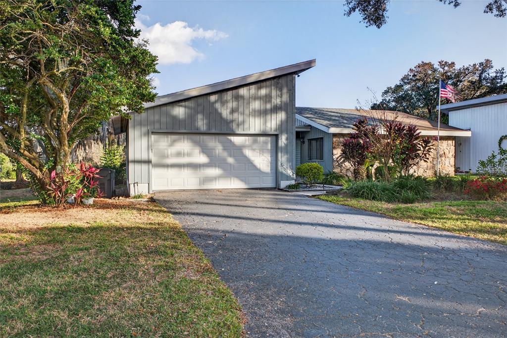 a view of a house with a garden