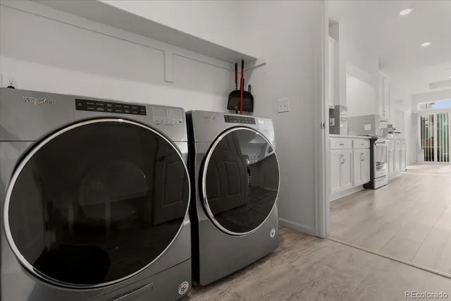 a utility room with dryer and washer