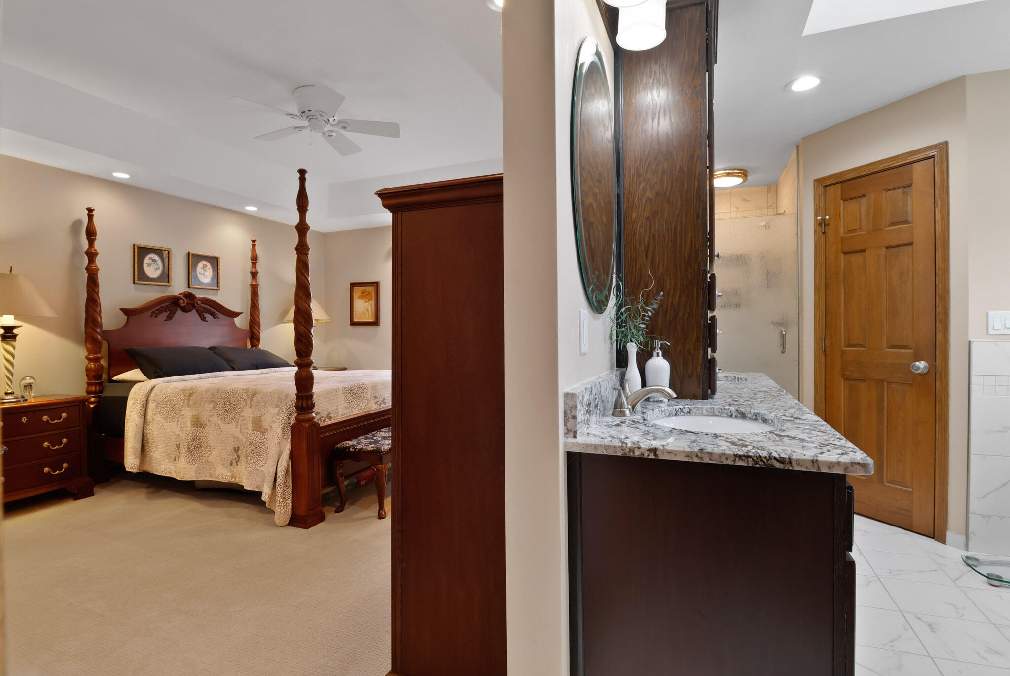 10030 Eagle Court Demotte, IN 46310 - Photo 12 of 49 a en suite bathroom with a granite countertop sink and a mirror
