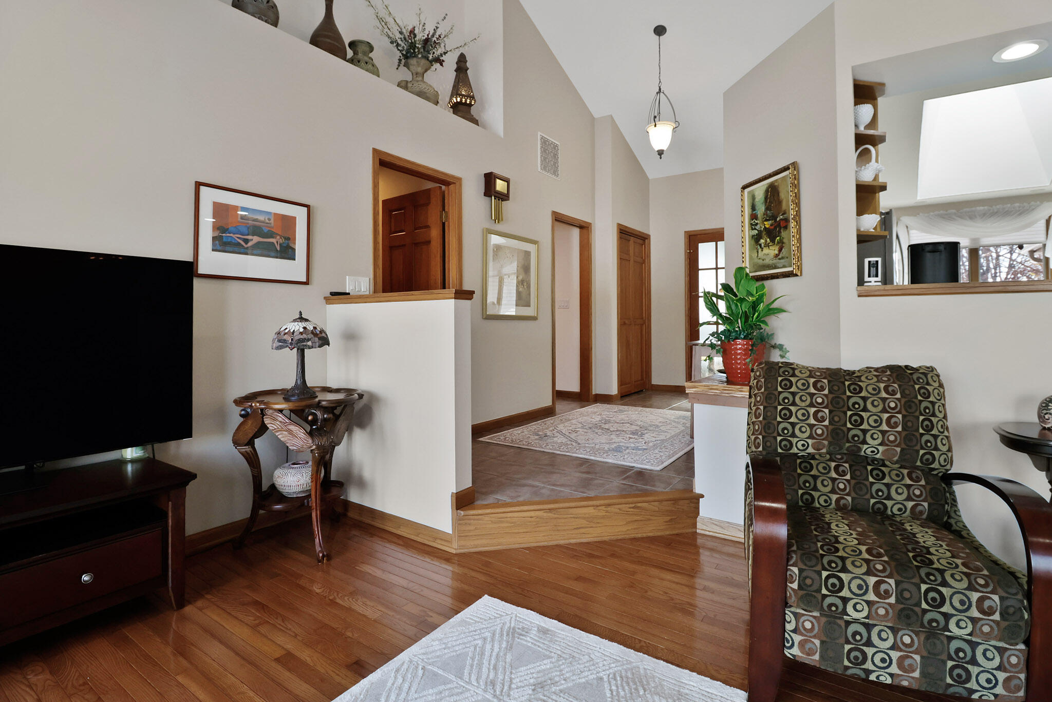10030 Eagle Court Demotte, IN 46310 - Photo 4 of 49 a living room with furniture and a flat screen tv