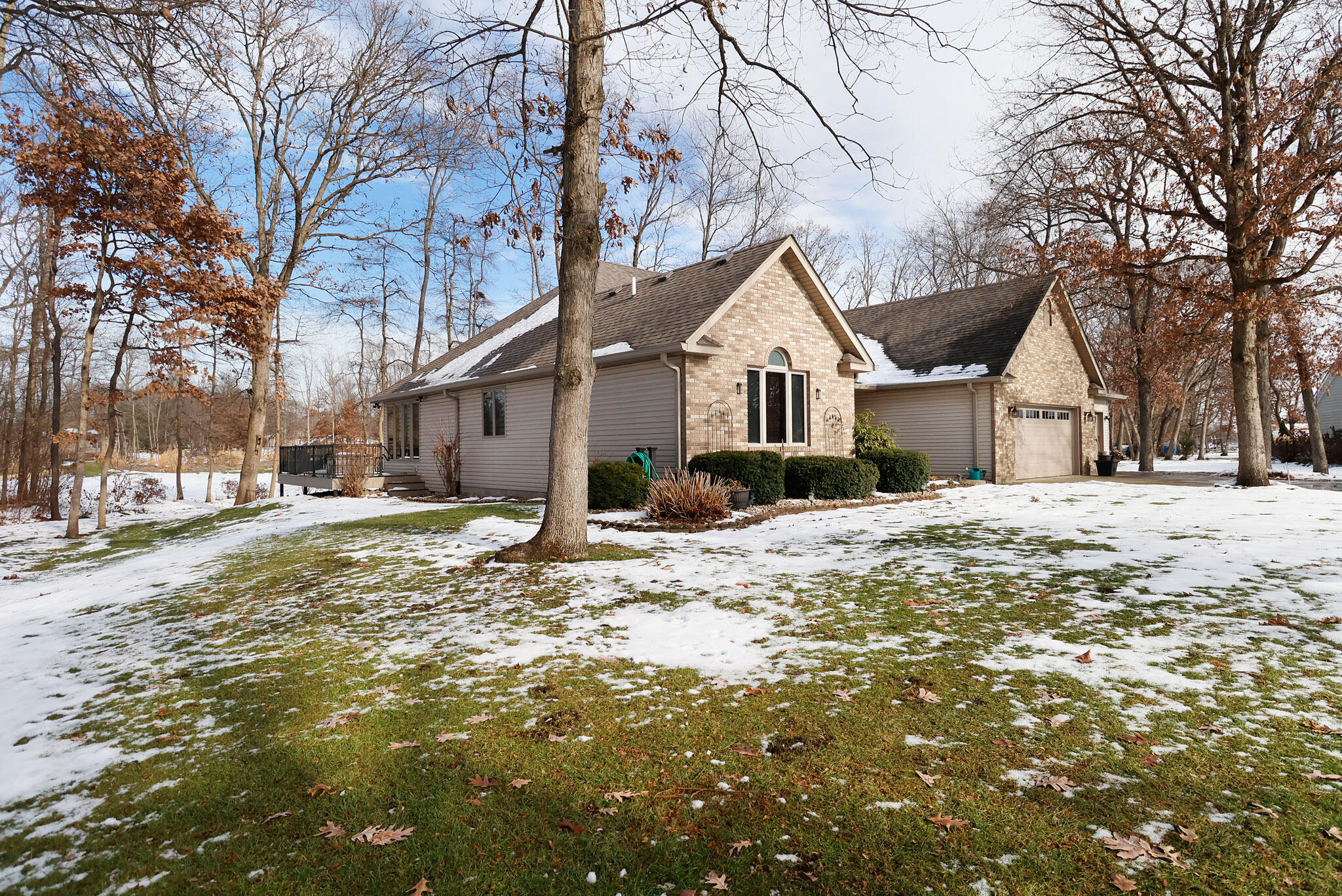 10030 Eagle Court Demotte, IN 46310 - Photo 42 of 49 a view of a house with a yard covered in snow