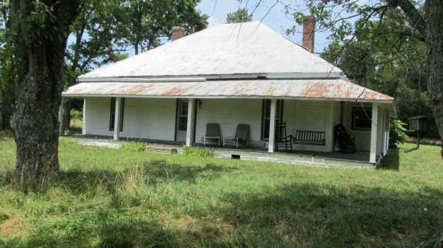 1543 Rutledge Lane Lewisburg, TN 37091 - Photo 3 of 20 a view of a house with backyard porch and garden