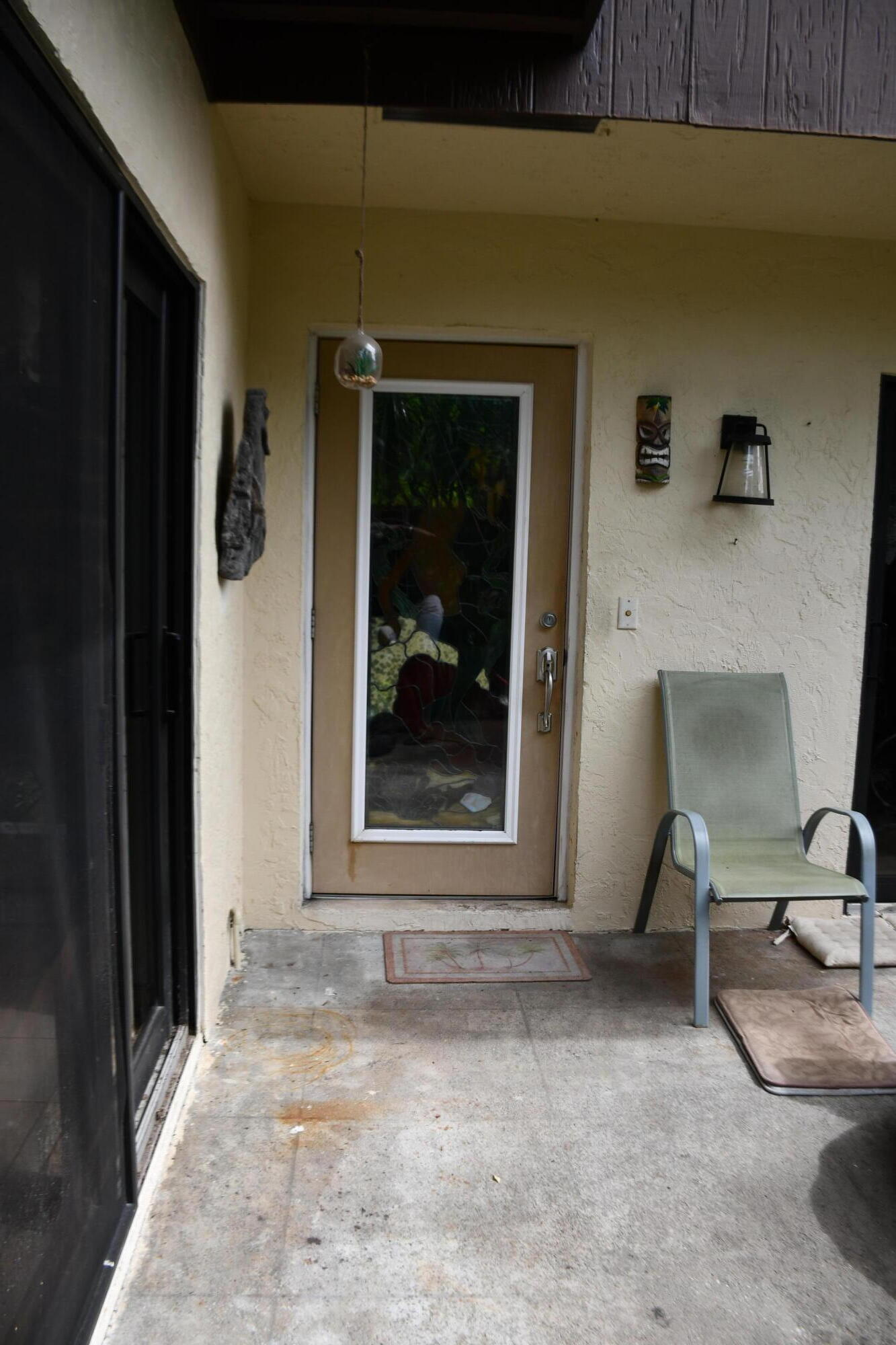 2936 Kirk Road Lake Worth, FL 33461 - Photo 9 of 23 a view of a hallway to a livingroom with furniture and a window