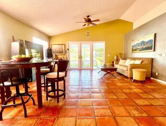 a kitchen with a sink and a stove top oven