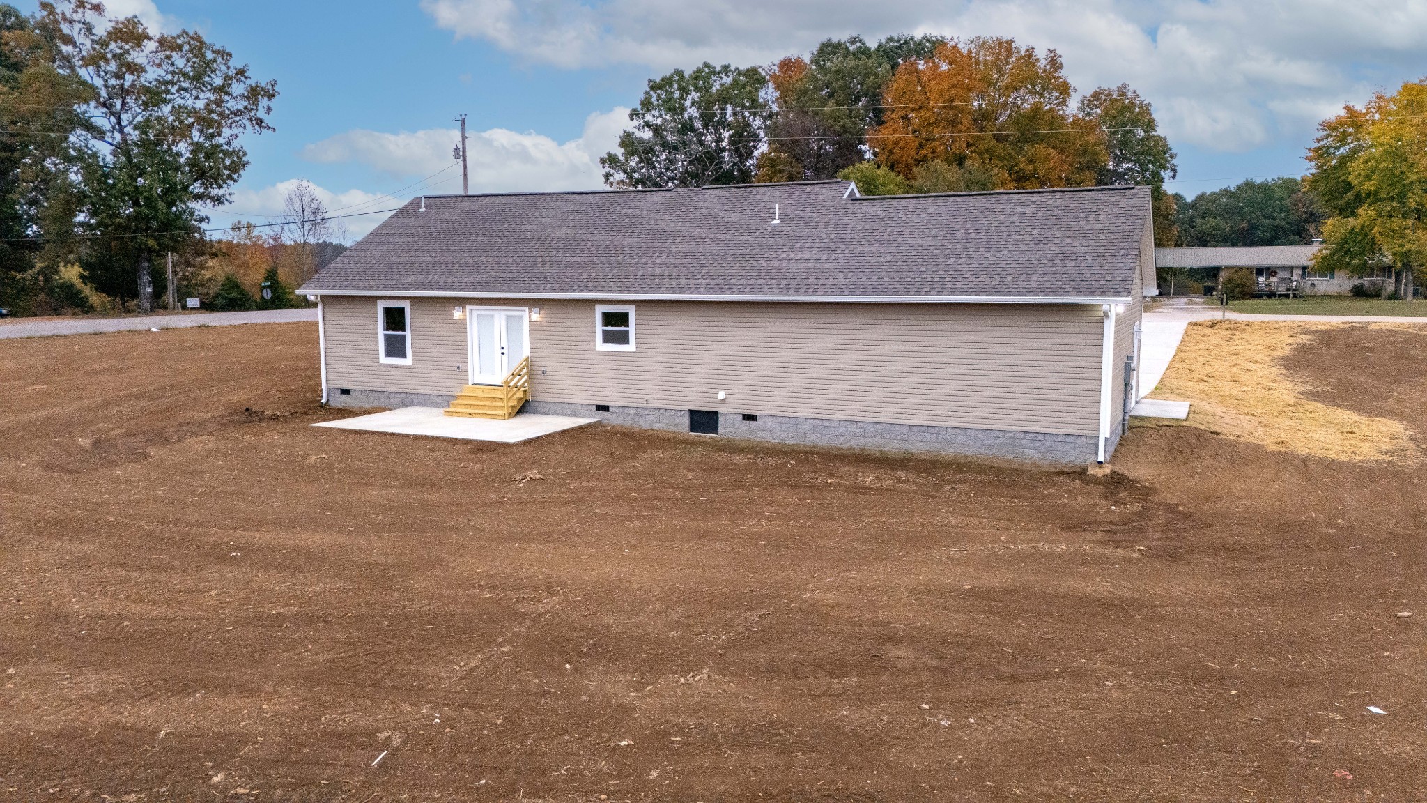 181 Rigling Road Loretto, TN 38469 - Photo 29 of 36 a view of a house with backyard and trees