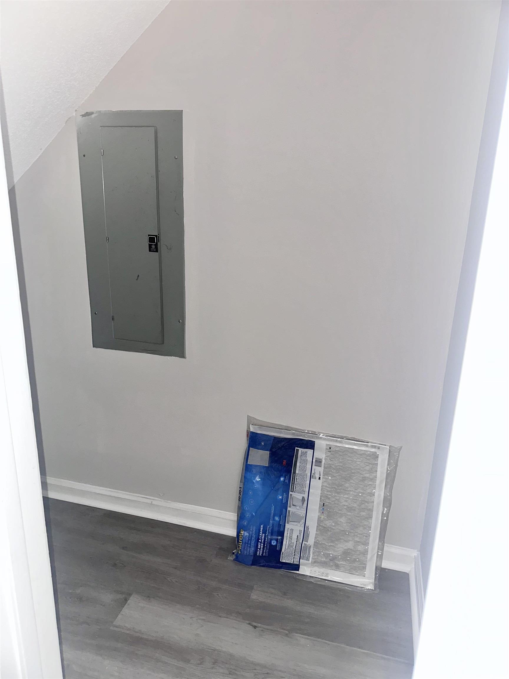 401 Garden Drive, Unit 100B Myrtle Beach, SC 29575 - Photo 8 of 23 Detailed view of electric panel and wood finished floors