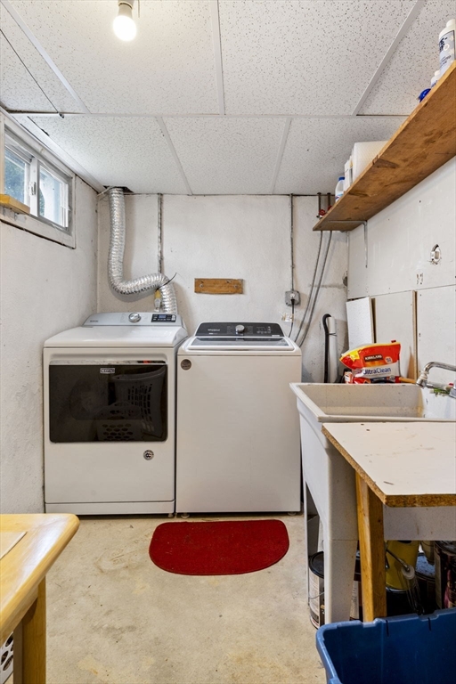 27 Raylen Avenue Peabody, MA 01960 - Photo 35 of 42 a utility room with dryer and washer