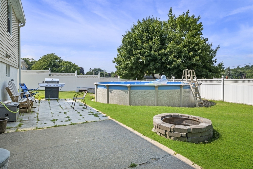 27 Raylen Avenue Peabody, MA 01960 - Photo 39 of 42 a view of a backyard with sitting area
