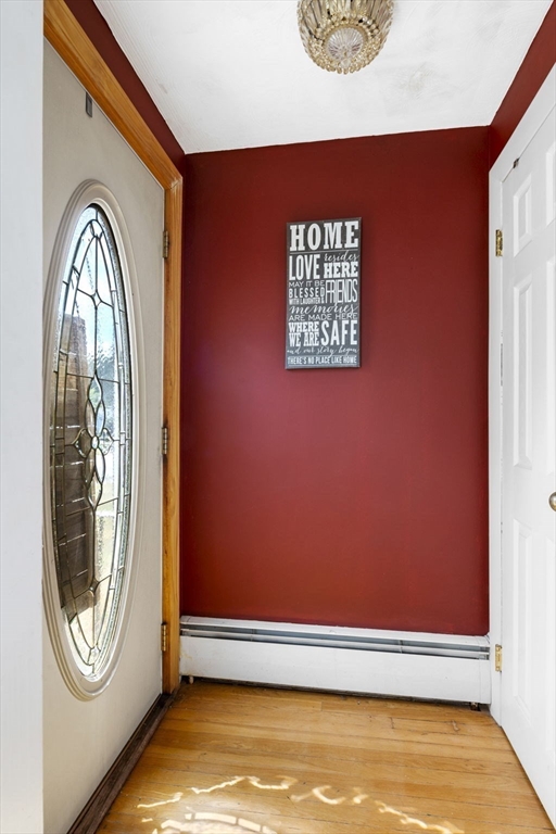 27 Raylen Avenue Peabody, MA 01960 - Photo 4 of 42 a view of a livingroom with washer and dryer