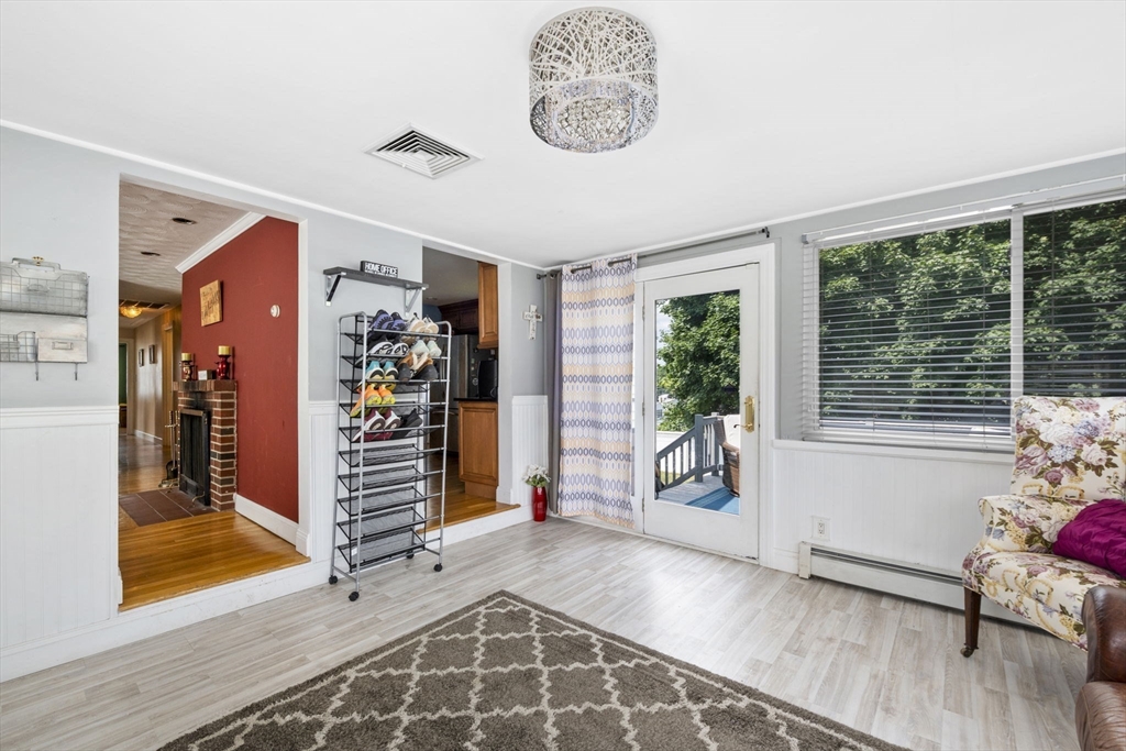 27 Raylen Avenue Peabody, MA 01960 - Photo 9 of 42 a view of a livingroom with furniture and windows