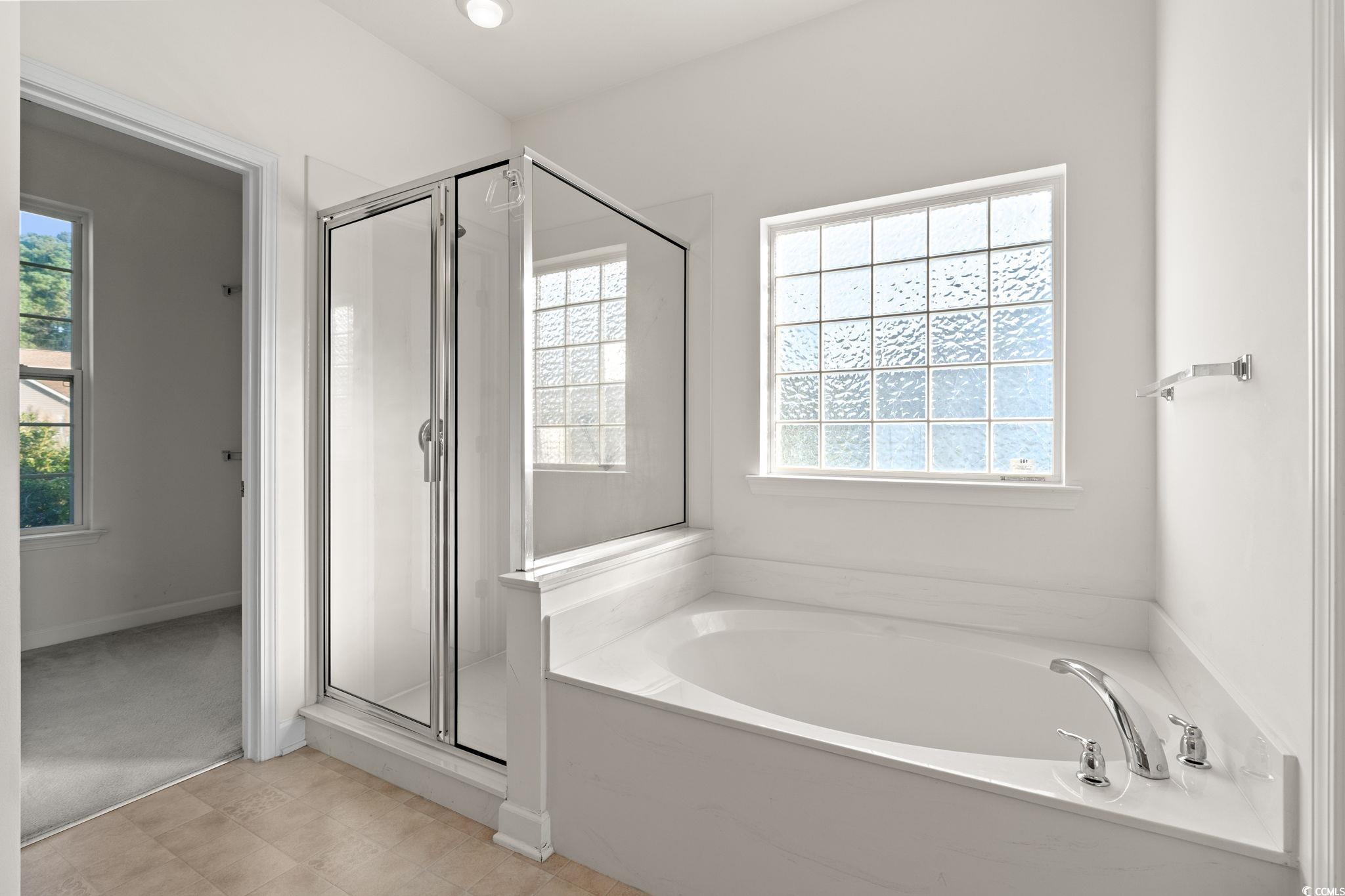 875 Brookline Drive Myrtle Beach, SC 29579 - Photo 16 of 40 Full bathroom featuring a garden tub and a shower stall