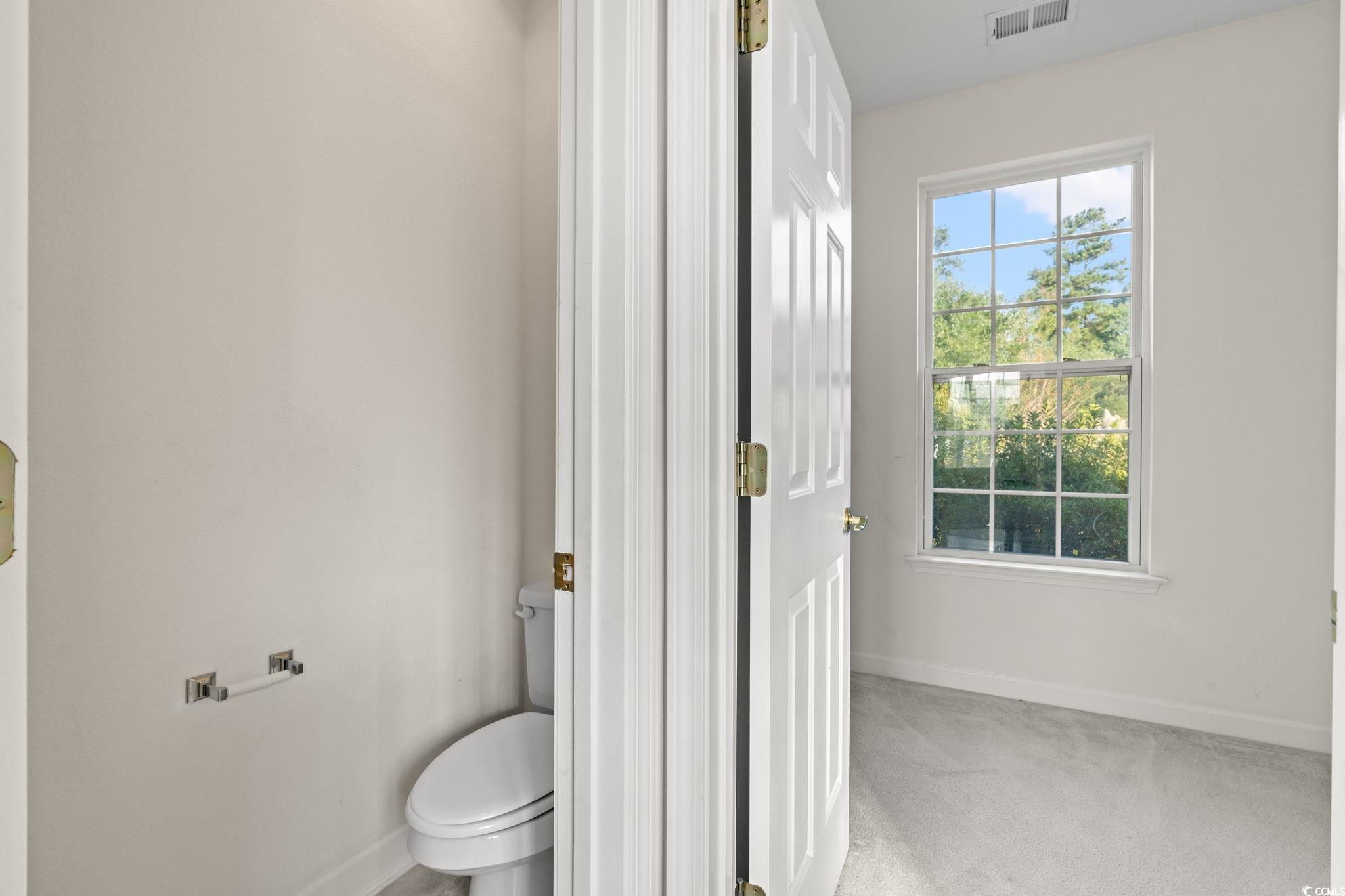 875 Brookline Drive Myrtle Beach, SC 29579 - Photo 17 of 40 Bathroom with toilet and baseboards