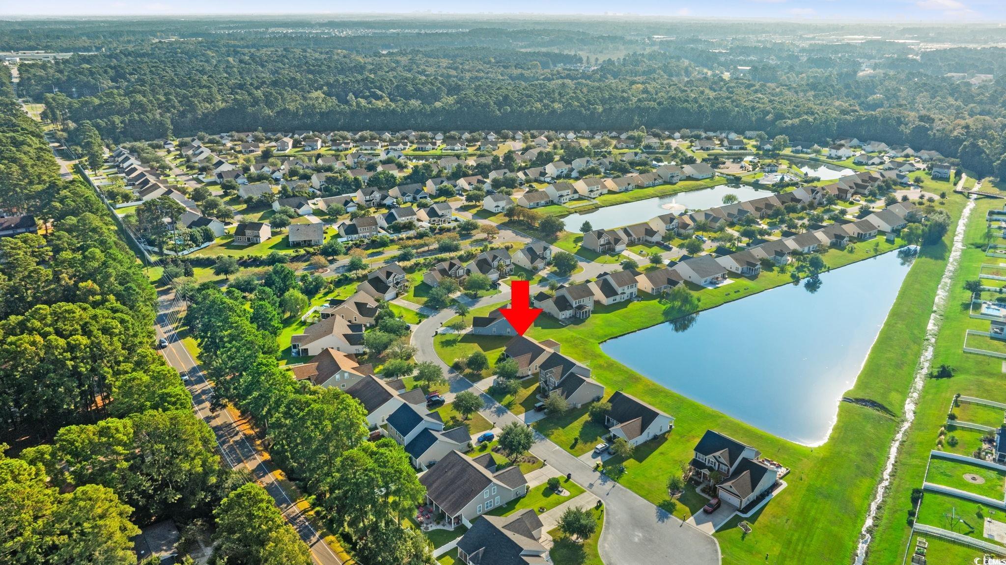 875 Brookline Drive Myrtle Beach, SC 29579 - Photo 32 of 40 Aerial perspective of suburban area featuring a large body of water