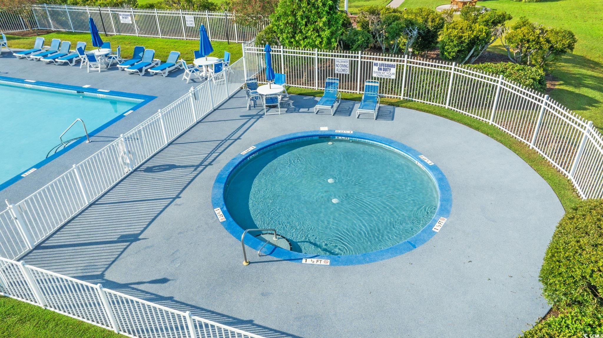 875 Brookline Drive Myrtle Beach, SC 29579 - Photo 38 of 40 Community pool featuring a hot tub