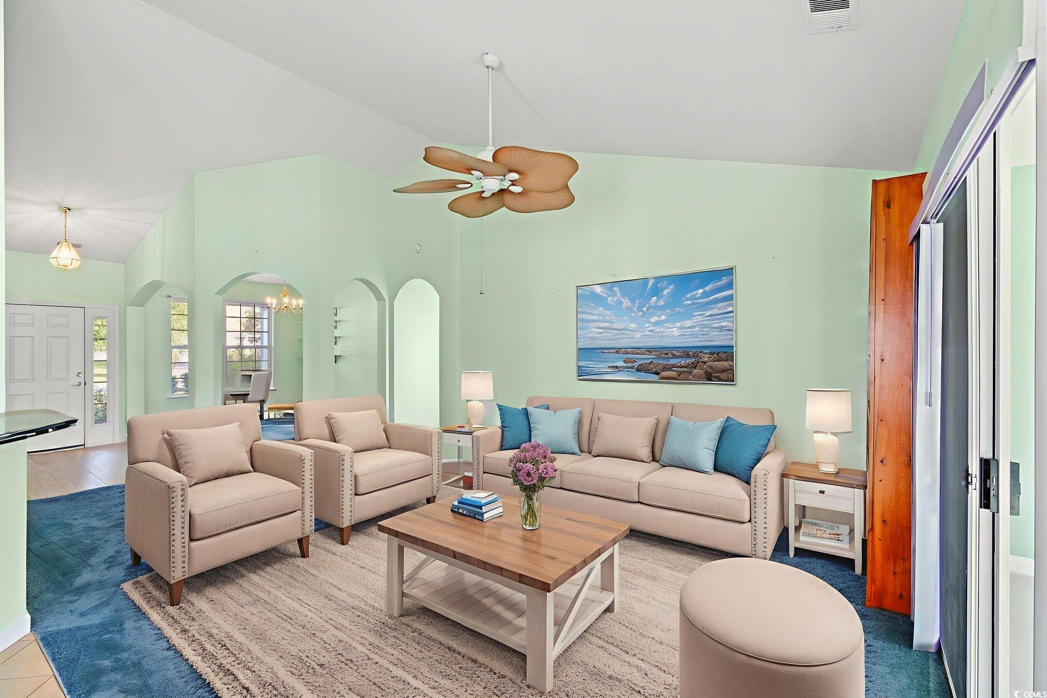 875 Brookline Drive Myrtle Beach, SC 29579 - Photo 9 of 40 Living room featuring high vaulted ceiling, a chandelier, and ceiling fan