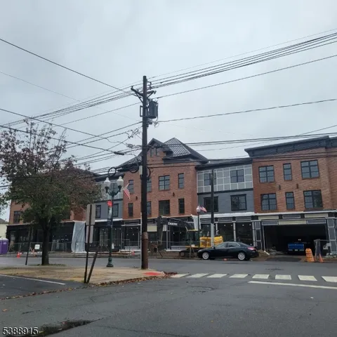 a view of a street with cars