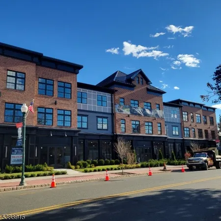 a view of a building and a street