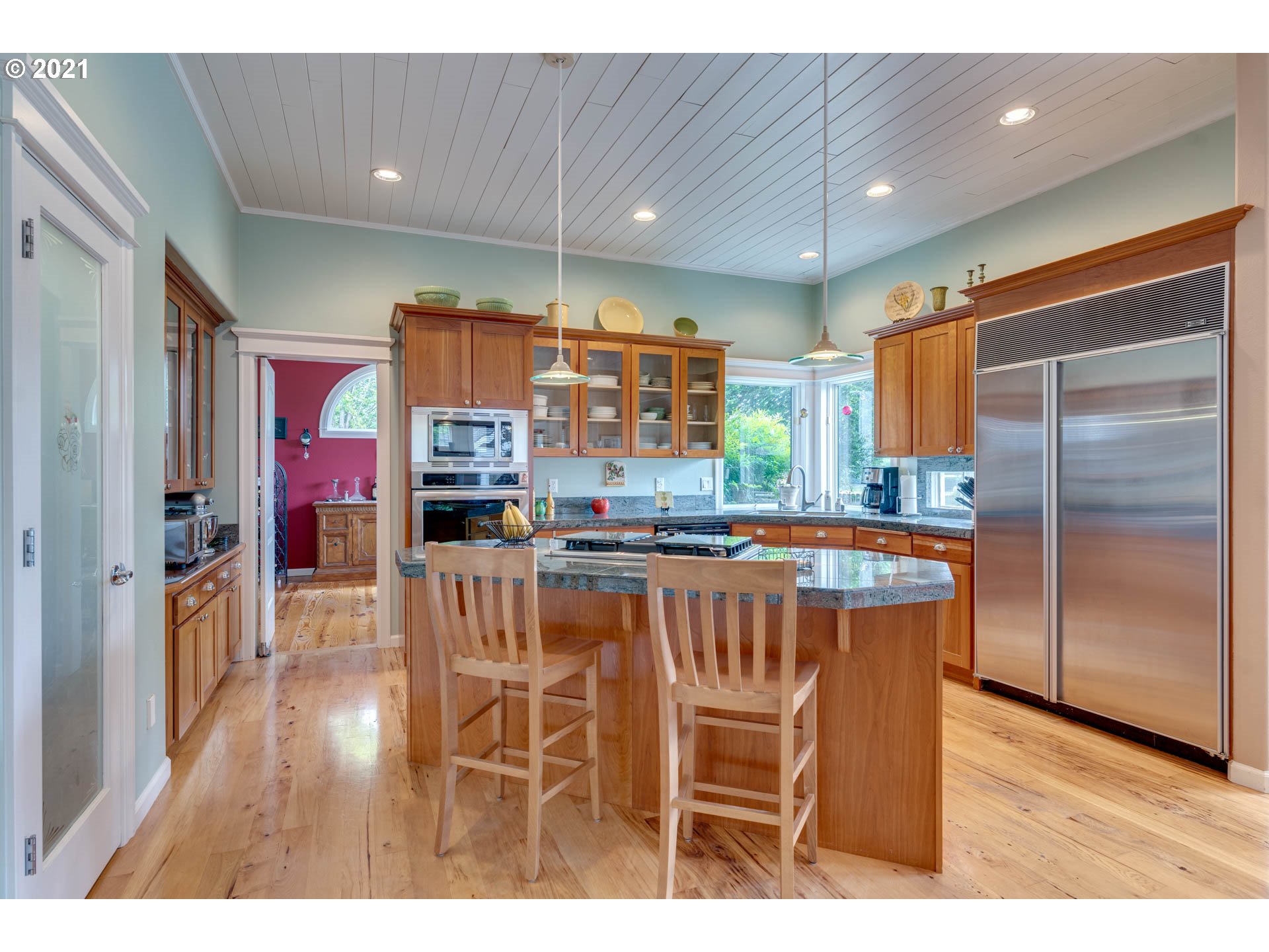27603 Northeast 10th Avenue Ridgefield, WA 98642 - Photo 11 of 32 a kitchen with stainless steel appliances granite countertop a refrigerator and a sink