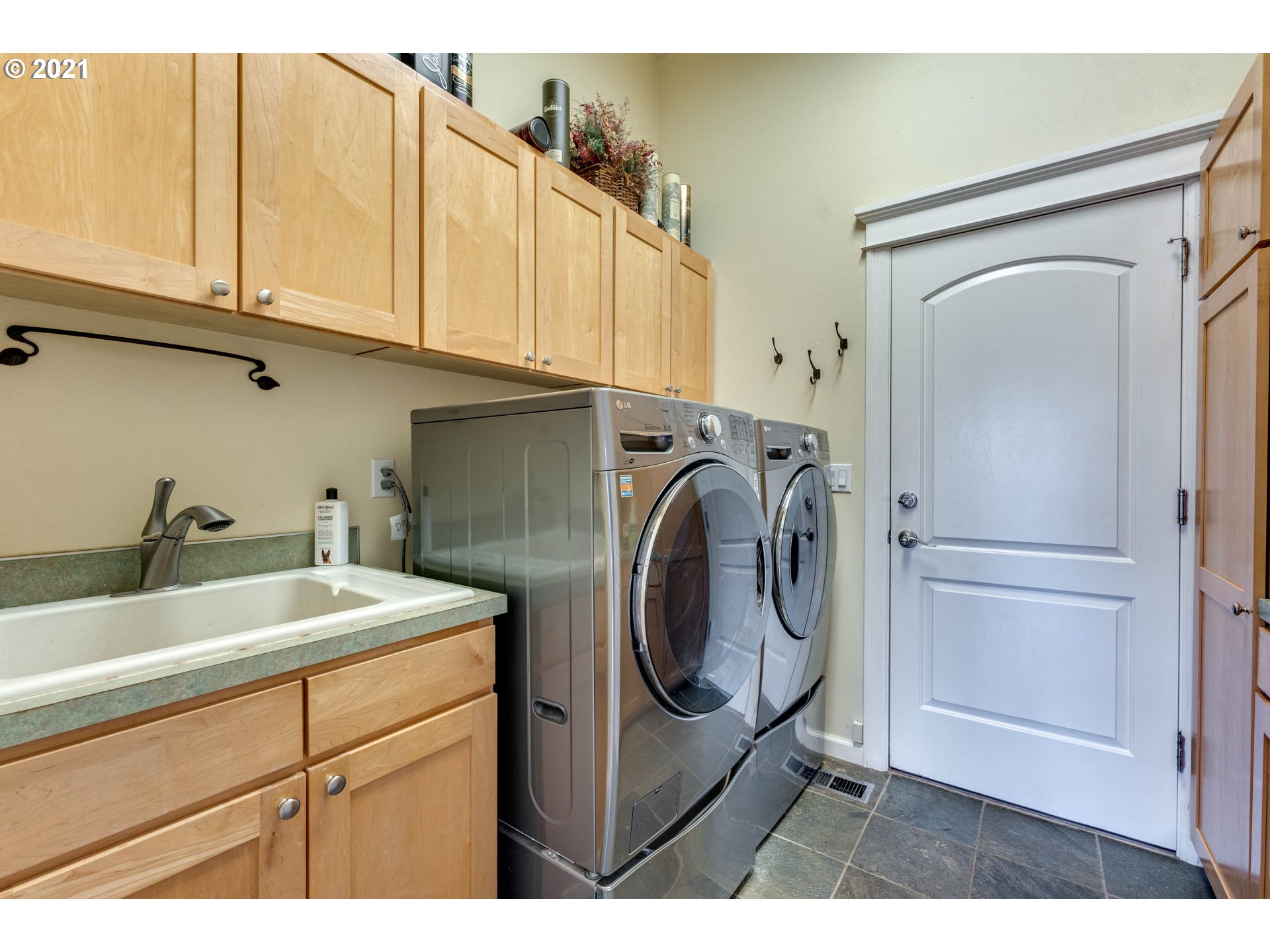 27603 Northeast 10th Avenue Ridgefield, WA 98642 - Photo 19 of 32 a utility room with sink dryer and washer