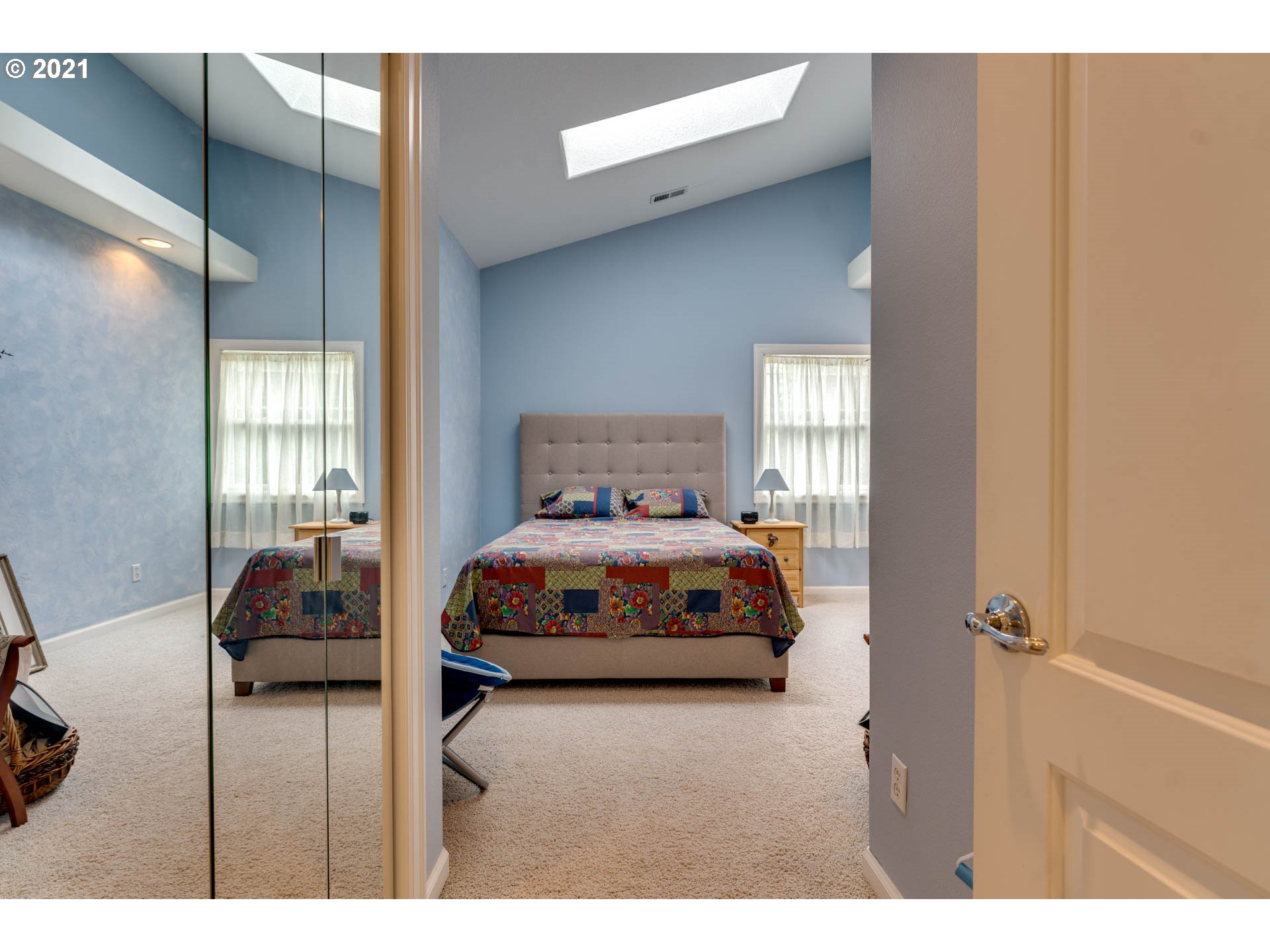 27603 Northeast 10th Avenue Ridgefield, WA 98642 - Photo 22 of 32 a bedroom with a bed and wooden floor