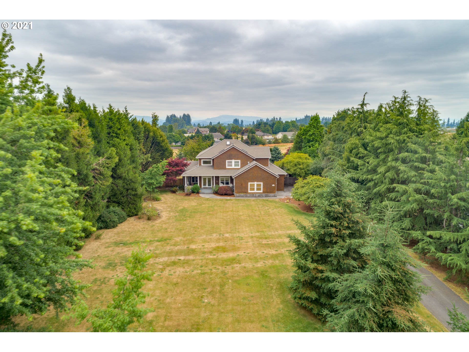 27603 Northeast 10th Avenue Ridgefield, WA 98642 - Photo 31 of 32 a view of a swimming pool with an outdoor space and seating area