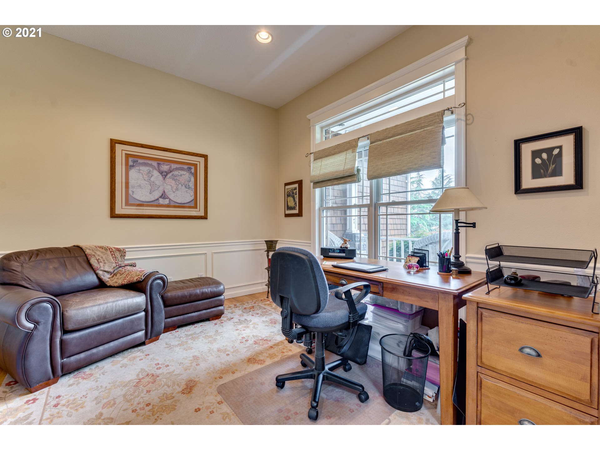 27603 Northeast 10th Avenue Ridgefield, WA 98642 - Photo 4 of 32 a view of a workspace with furniture and a window