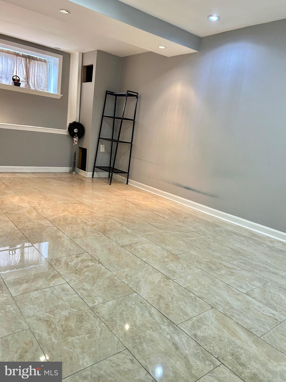 4032 Vista Street Philadelphia, PA 19136 - Photo 12 of 17 an empty room with wooden floor and windows
