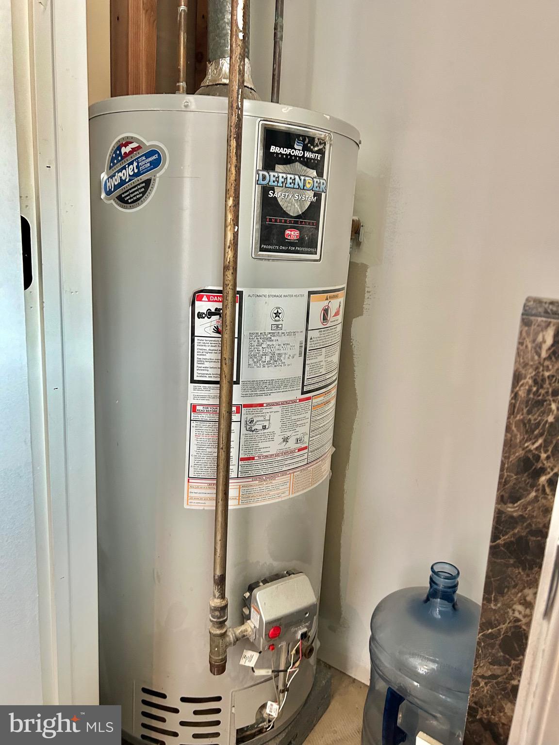 4032 Vista Street Philadelphia, PA 19136 - Photo 16 of 17 a room with a refrigerator and washer