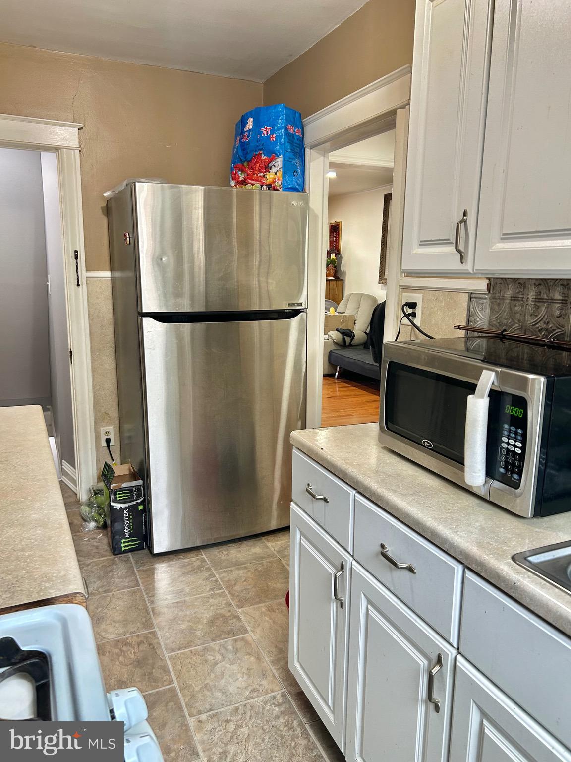 4032 Vista Street Philadelphia, PA 19136 - Photo 5 of 17 a kitchen with appliances and a refrigerator