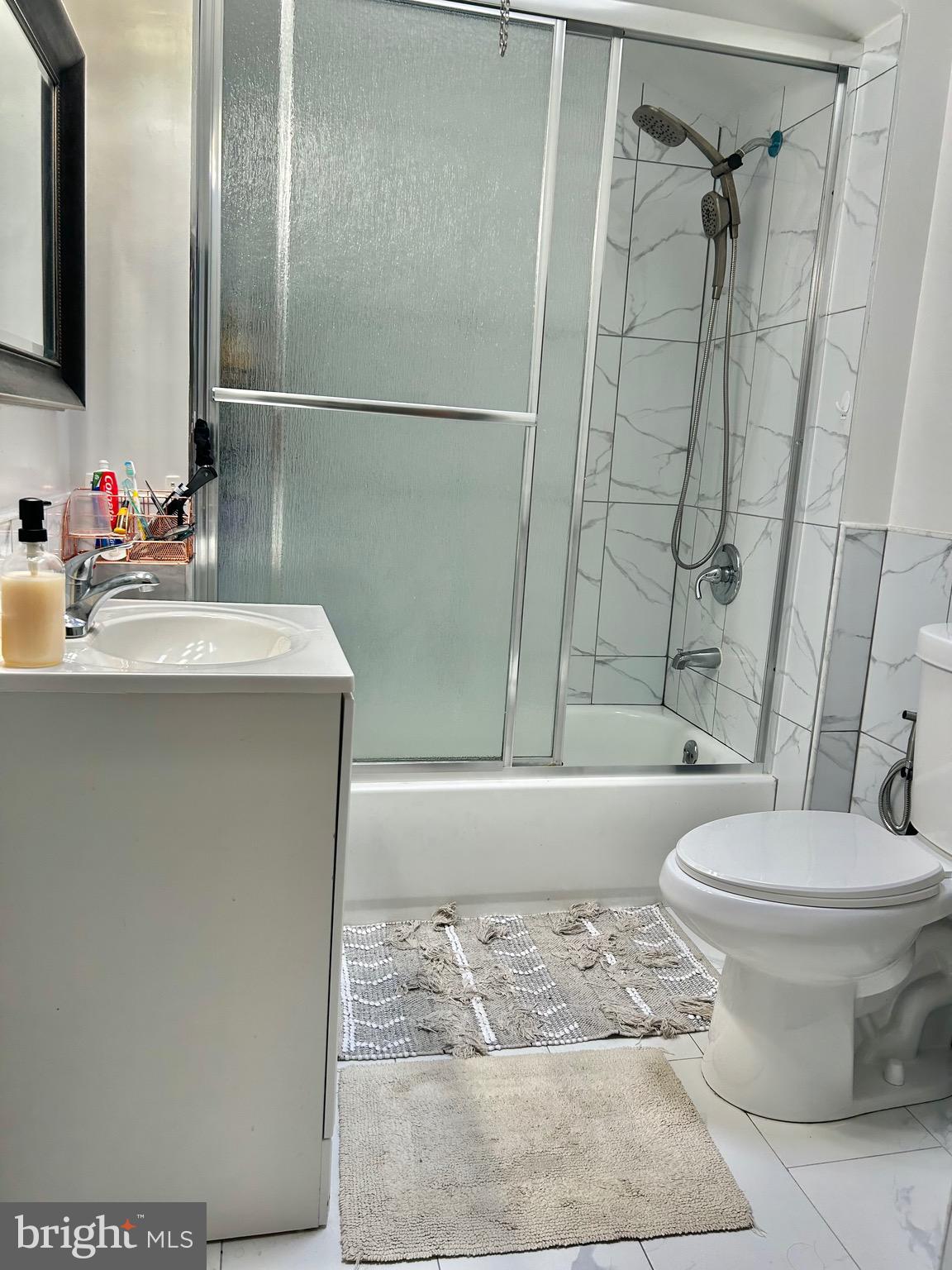 4032 Vista Street Philadelphia, PA 19136 - Photo 9 of 17 a bathroom with a sink toilet and shower