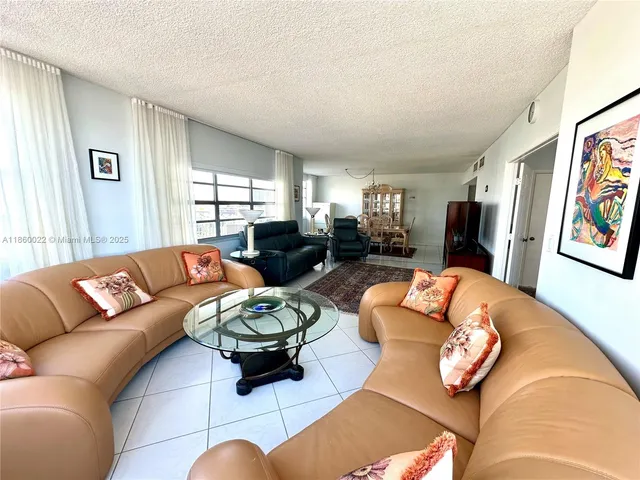 a bathroom with a sink toilet and a mirror