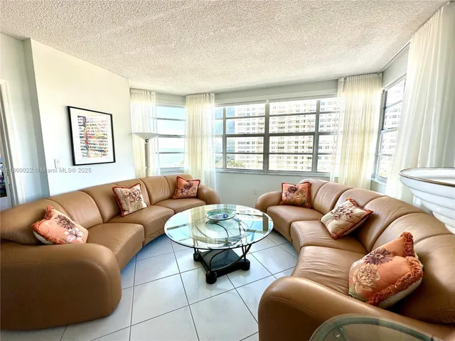 a bedroom with a bed and a lamp